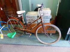 A VINTAGE RALEIGH BICYCLE.