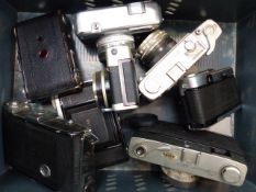 A QUANTITY OF VINTAGE CAMERAS TO INCLUDE CANON, YASHICA, MINOLTA, OLYMPUS, ZEISS IKON, BESSA 66,