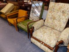 AN UNUSUAL MID CENTURY RECLINING ARMCHAIR, A SIMILAR LATER ARMCHAIR AND ONE OTHER.
