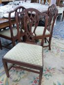 A SET OF SIX GEORGIAN MAHOGANY DINING CHAIRS.