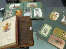 A COLLECTION OF POSTCARDS AND PHOTO ALBUMS.