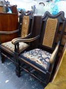 A PAIR OF OAK ARMCHAIRS WITH TAPESTRY SEATS.