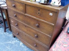 A GEORGIAN OAK CHEST OF DRAWERS.