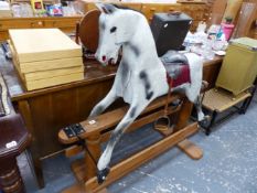 A GOOD QUALITY VINTAGE ROCKING HORSE.