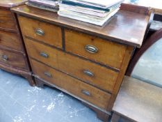 AN EDWARDIAN INLAID CHEST OF DRAWERS.
