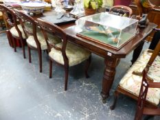 A VICTORIAN MAHOGANY DINING TABLE.