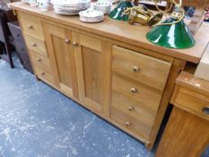 A MODERN OAK SIDEBOARD.