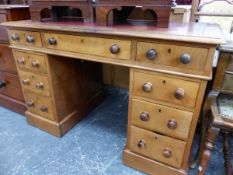 A VICTORIAN WALNUT TWIN PEDESTAL WRITING DESK.