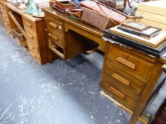 TWO OAK PEDESTAL DESKS AND A FILING CABINET.