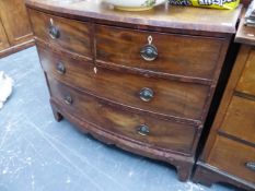 A GEORGIAN MAHOGANY BOW FRONT CHEST OF DRAWERS.