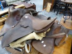 A QTY OF VINTAGE SADDLES,ETC.