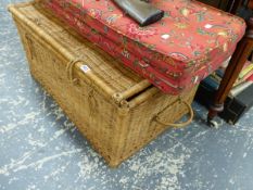 A WICKER HAMPER AND TWO CUSHIONS.