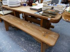 A PINE KITCHEN TABLE AND TWO BENCHES.