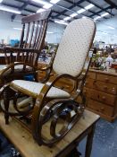 A BENTWOOD ROCKING CHAIR.