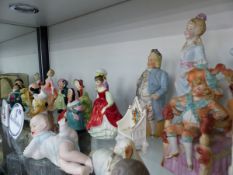 A COLLECTION OF VINTAGE DOULTON AND EARLIER BISQUE FIGURINES,ETC.