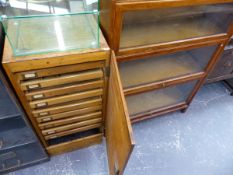 A GLOBE WERNICKE TYPE BOOKCASE AND A CHEST OF TOOL DRAWERS.