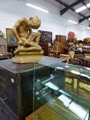 A PERSPEX DISPLAY STAND AND AN ART DECO FIGURE OF A CHILD.