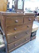 A VICTORIAN MAHOGANY CHEST OF DRAWERS.