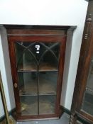 A 19th.C.MAHOGANY CORNER CABINET.