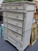 A LARGE PAINTED FRENCH TALL CHEST OF TWO SHORT AND FIVE LONG DRAWERS.