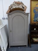 AN ANTIQUE STYLE PINE SMALL WARDROBE.