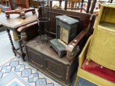 AN OAK MONK'S BENCH WITH BOX SEAT.