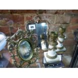 A PAIR OF FRENCH BRONZE MOUNTED MARBLE CANDLESTICKS AND TWO GILT BRASS EASEL BACK FRAME MIRRORS.