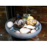 A QUANTITY OF HARDSTONE EGG HAND COOLERS AND SPECIMEN STONES.