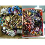 TWO BOXES OF ASSORTED COSTUME JEWELLERY.