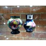 TWO MOORCROFT SMALL VASES.