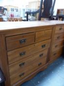 AN EDWARDIAN SATINWOOD CHEST OF DRAWERS.