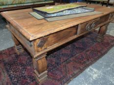 A HARDWOOD COFFEE TABLE.