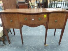 A MAHOGANY SERPENTINE SIDEBOARD.