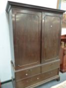 A GEORGIAN MAHOGANY LINEN PRESS AND THREE VICTORIAN SIDE CHAIRS.