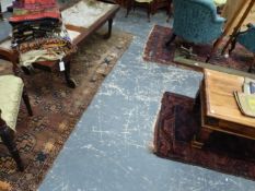 THREE ANTIQUE EASTERN RUGS.