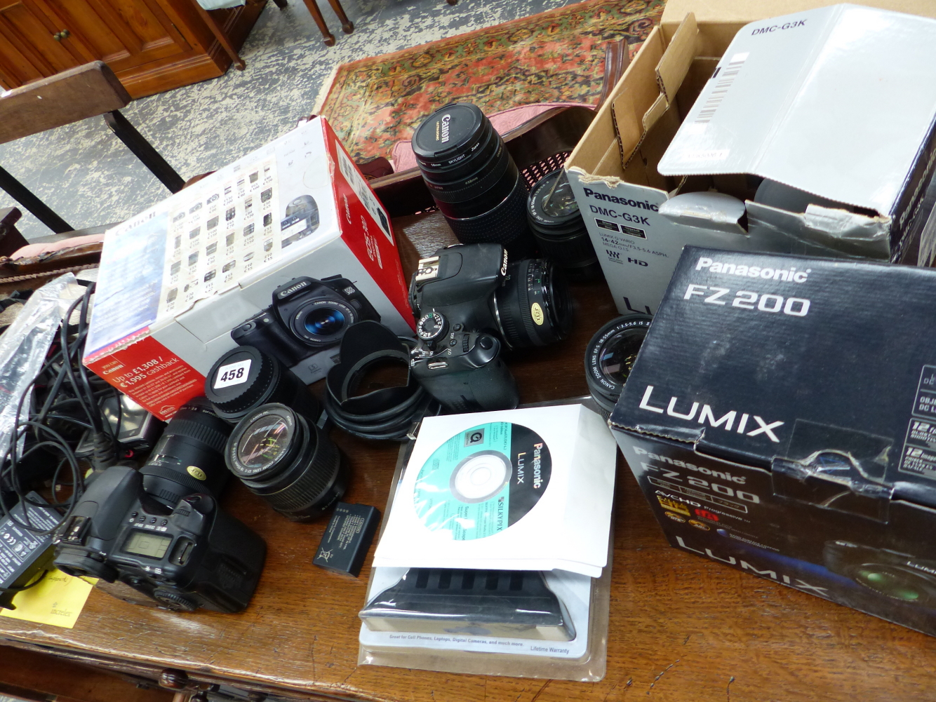 TWO CANON CAMERAS, VARIOUS LENSES,ETC.