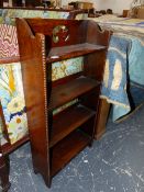 A SMALL OAK BOOKCASE.