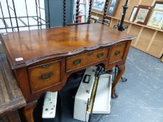 A FLAME MAHOGANY AND WALNUT LOWBOY/SIDE TABLE.