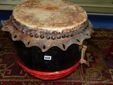 A LARGE ORIENTAL DRUM.