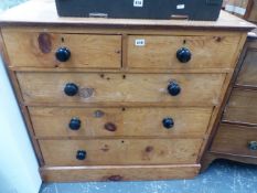 A VICTORIAN PINE CHEST OF DRAWERS.