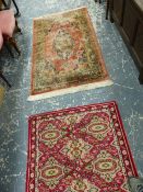 TWO RUGS.