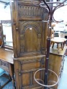 A TITCHMARSH & GOODWIN BESPOKE OAK CORNER CABINET.