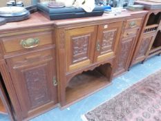 A VICTORIAN WALNUT SIDE CABINET.