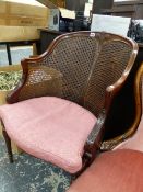 A BERGERE ARMCHAIR.