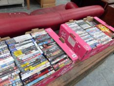 A QTY OF DVDS,ETC.