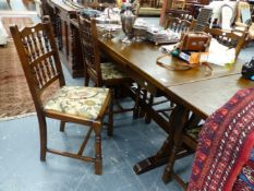 AN OAK REFECTORY TYPE DINING TABLE AND SIX CHAIRS