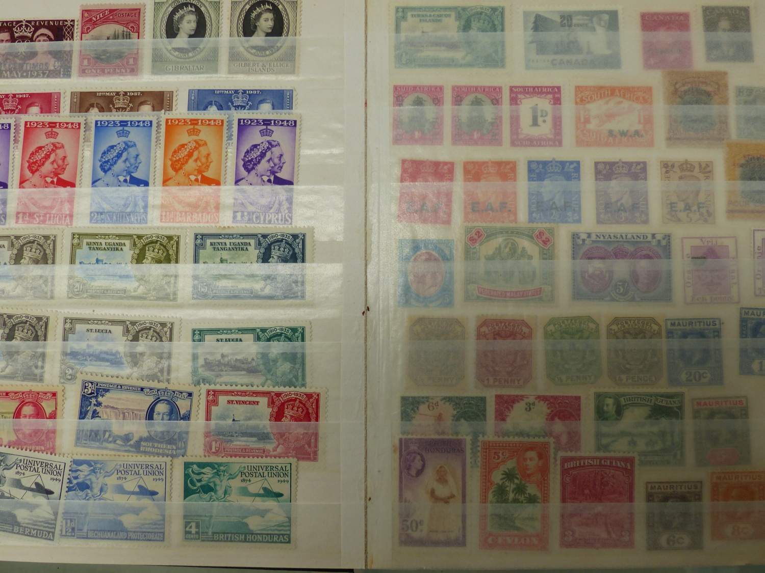 MINT, USED AND COMMONWEALTH STAMPS IN 7 ALBUMS.