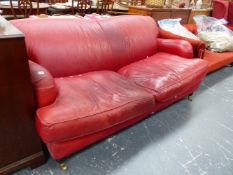 A LEATHER HOWARD STYLE SETTEE.