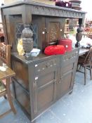 AN OAK COURT CUPBOARD.