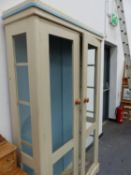 A PAINTED DISPLAY CABINET.